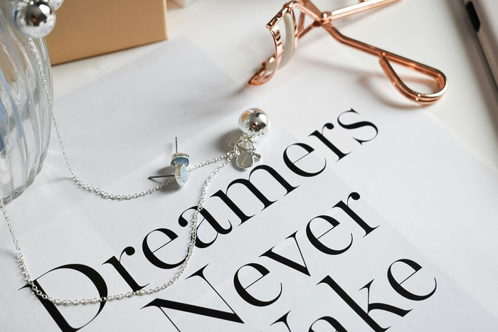 luxury 925 silver bracelet on a book