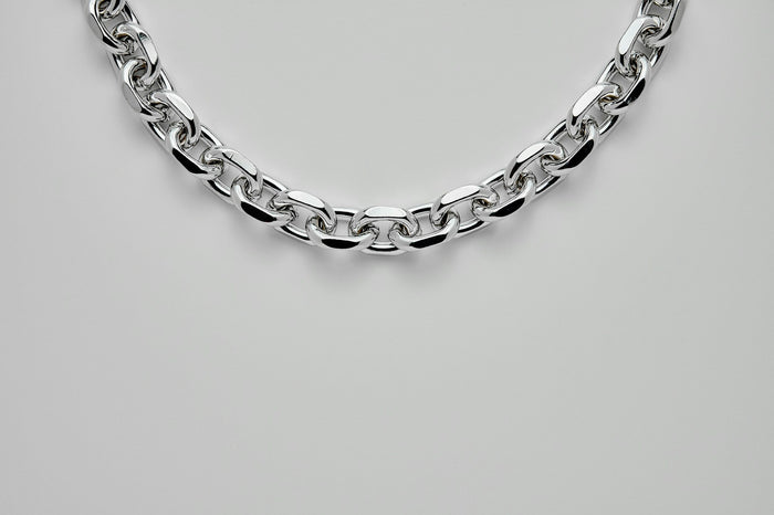 Close-up of 925 Italy silver chain with intricate detailing.